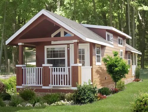 Rustic tiny home exterior with porch in forest