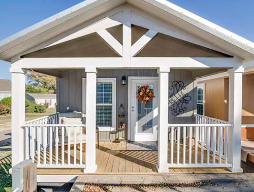 Tiny home front porch with white columns